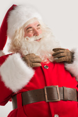 Portrait of happy Santa Claus thinking