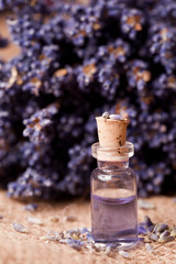 Obraz na płótnie Canvas lavender flower with liquid homeopathic fragrance