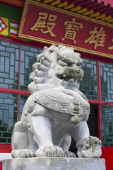 Fototapeta na wymiar Lion statue in Chinese Temple in Hong Kong
