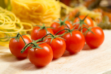 close-up of cherry tomatoes and pasta