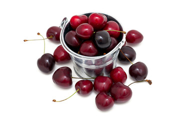 cherries in a metallic bucket
