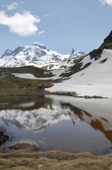Reflections  in waters of  Schwarzsee beneath Matterhorn
