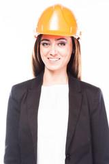 young beautiful woman in yellow construction helmet 