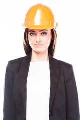 young beautiful woman in yellow construction helmet 