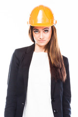 young beautiful woman in yellow construction helmet 