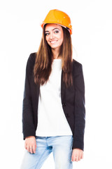 young beautiful woman in yellow construction helmet 