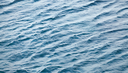 Blue sea water surface. Natural photo background texture