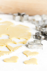 still life of dough with cookie cutters