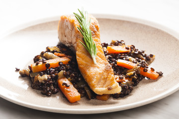 salmon fillet with lentils and carrot