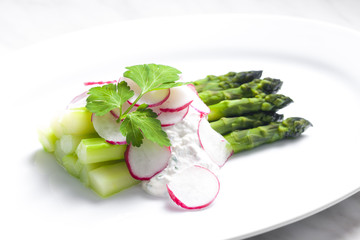 green asparagus with radish salad