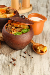 Homemade beef stir fry with vegetables in pots