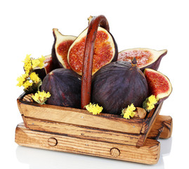 Ripe figs in basket isolated on white