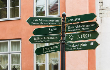 Signpost with a Group of Signs in the Historic Center of Tallinn