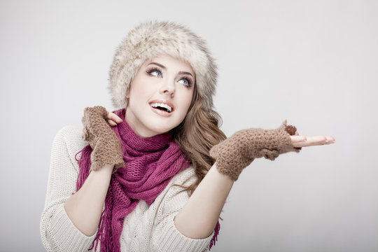 Young Beautiful Woman Wearing Fur Hat And Scarf