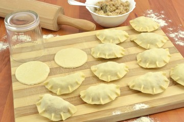 raw dumplings with sauerkraut and meat