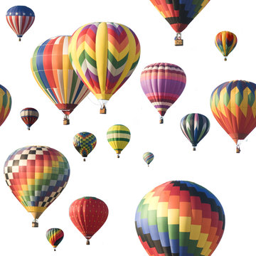 Colorful hot-air balloons floating against white