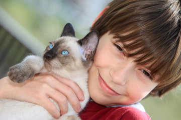 little boy with kitten