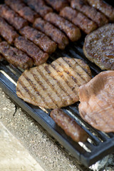 grilled meat on the barbeque plate