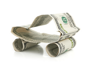 car made from dollar isolated on white background