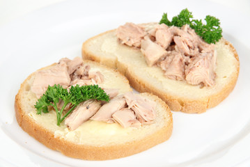 Tasty sandwiches with tuna and cod liver, isolated on white