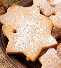 Homemade Christmas cookies sprinkled with powdered sugar