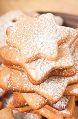 Homemade Christmas cookies sprinkled with powdered sugar