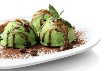 Delicious ice cream on plate isolated on white