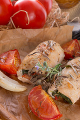 Chicken breast with spinach, baked tomatoes and herbs