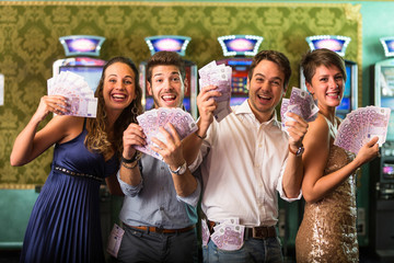 Friends Winning a lot of Money at Casino