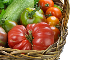 Close-up of heirloom tomatoes and white zucchini.Isolated.