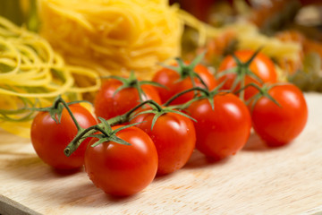 close-up of cherry tomatoes and pasta