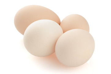 Four eggs on white