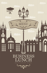 Obraz premium menu for business lunches with the old town and a street lamp