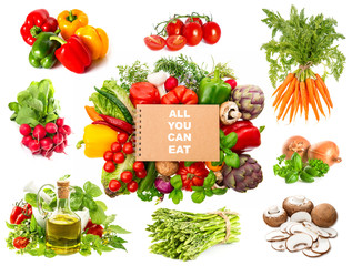 variety fresh herbs and vegetables and recipe book