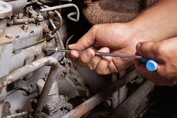 Fototapeta premium Engine service. Worker hands.