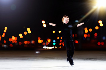 Young boy figure skating
