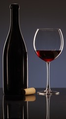Naklejka na ściany i meble Elegant photo of a glass of red wine