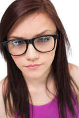 Obraz premium Close up on pretty brunette with glasses posing