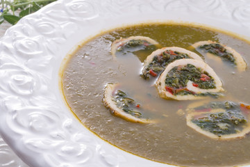 Cabbage soup with meat rolls