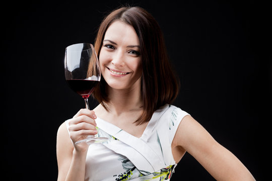 woman holding wine glass