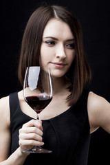 woman holding wine glass