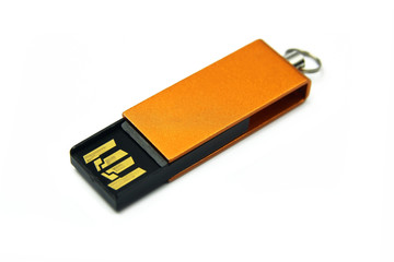 gold pendrive on white background