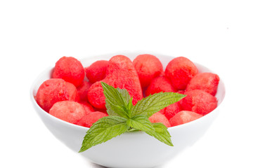 Watermelon sliced heart shape on white bacground