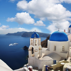 Fototapeta na wymiar Santorini with churches and sea view in Greece