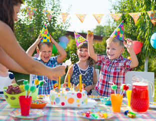 Group of kids having fun at birthday party