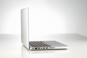 A beautifully lit modern alloy laptop computer