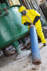 technician in  uniform,  dealing with steel cylinder wh gas