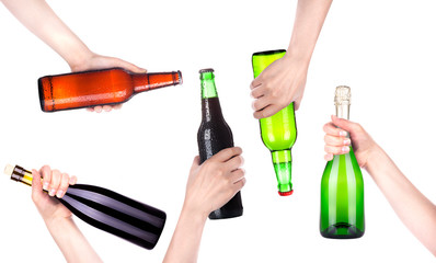 bottle of beer, champagne and wine in a hand