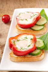 scrambled in sweet pepper on toast with greens
