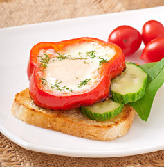 scrambled in sweet pepper on toast with greens